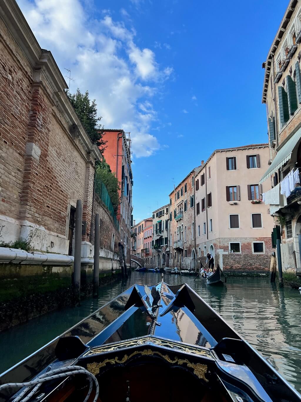 The best experience on a Florence to Venice day trip is the gondola ride